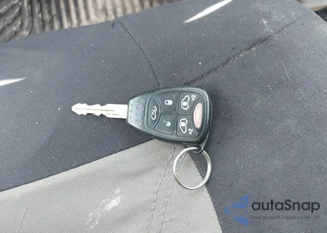 2005 Dodge Grand Caravan Sxt z USA, uszkodzony, nr VIN 2D4GP44L95R242873